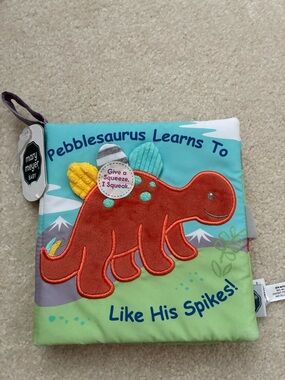 Mary Meyer Baby Pebblesaurus Soft Squeak Cloth Book